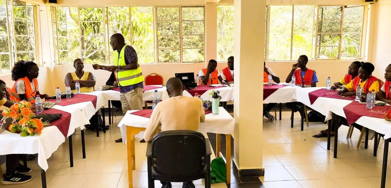 Mentor leading a training session for Oloowere Foundation scholarship students in Kenya